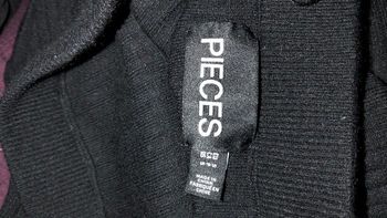 Jupe moulante noir marque pièces taille s