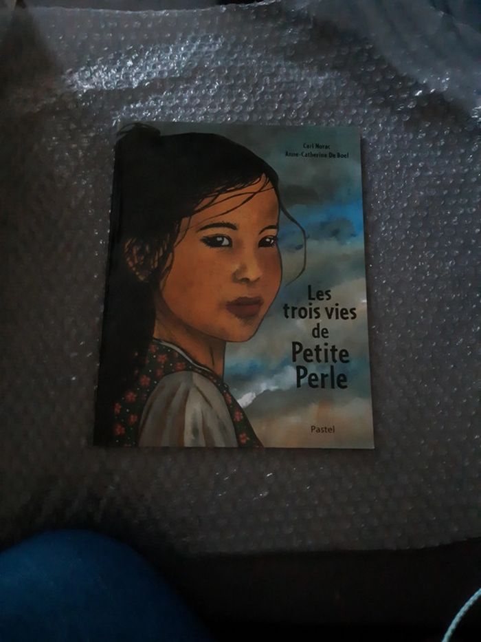 Les trois vies de petite perle