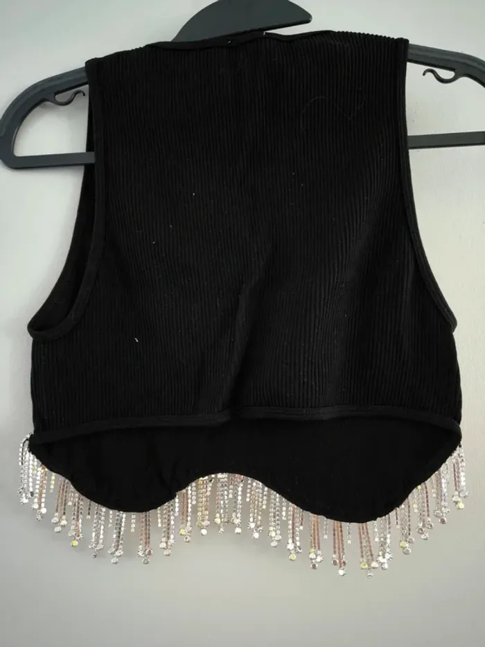 Top noir ZARA – Taille M/L – Collection spéciale
Neuf - photo numéro 3