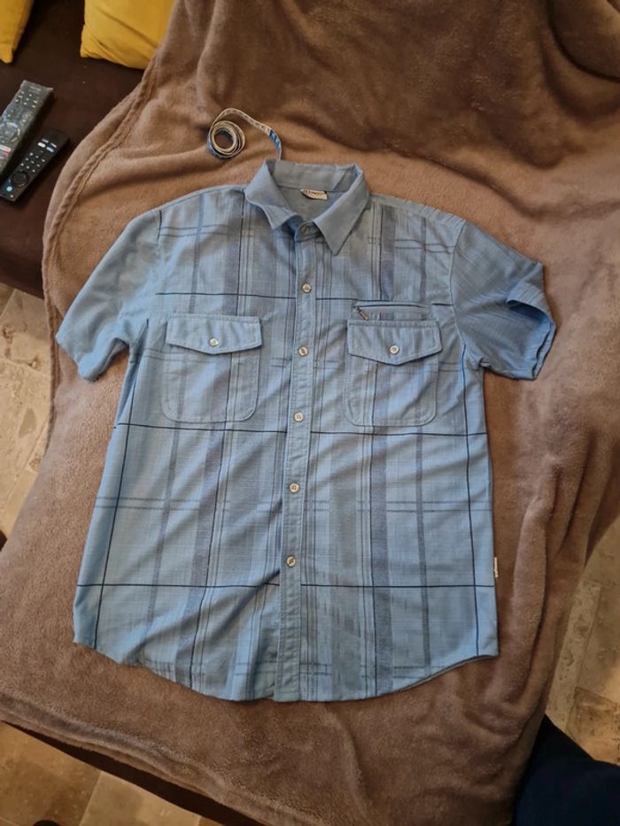 Chemise manche courte bleu à liseré