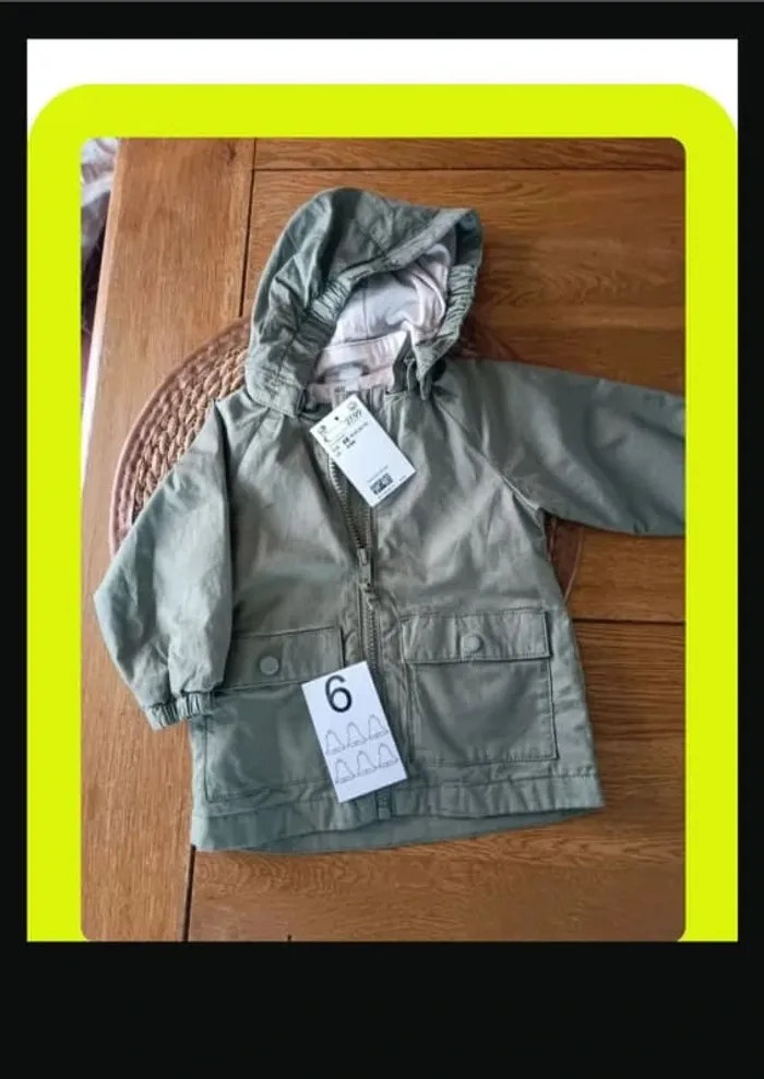 Manteau neuf 6 mois c&a