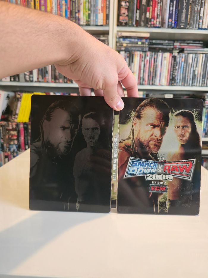 Jeu XBOX 360 avec Steelbook Smack Down VS Raw - photo numéro 4