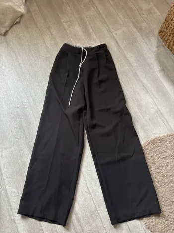 Pantalon jambes larges