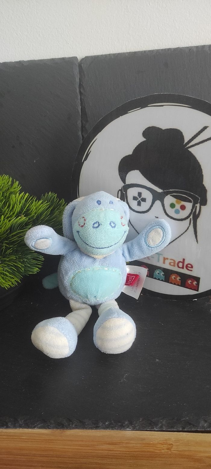 Doudou cheval âne zèbre bleu peluche tex baby bleu blanc rayé rayure rond rouge