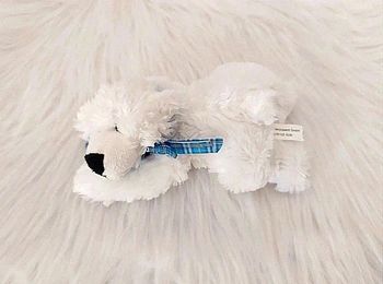 Peluche nounours blanc allongé
