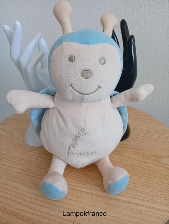 Doudou coccinelle écru bleu beige 23cm