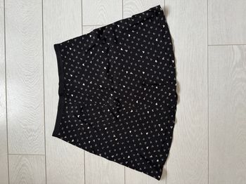 Jupe Naf Naf noire et coeurs blancs