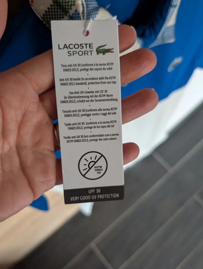 Polo Lacoste. Neuf. XS - photo numéro 8