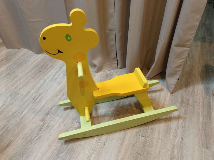 Bascule en bois girafe.