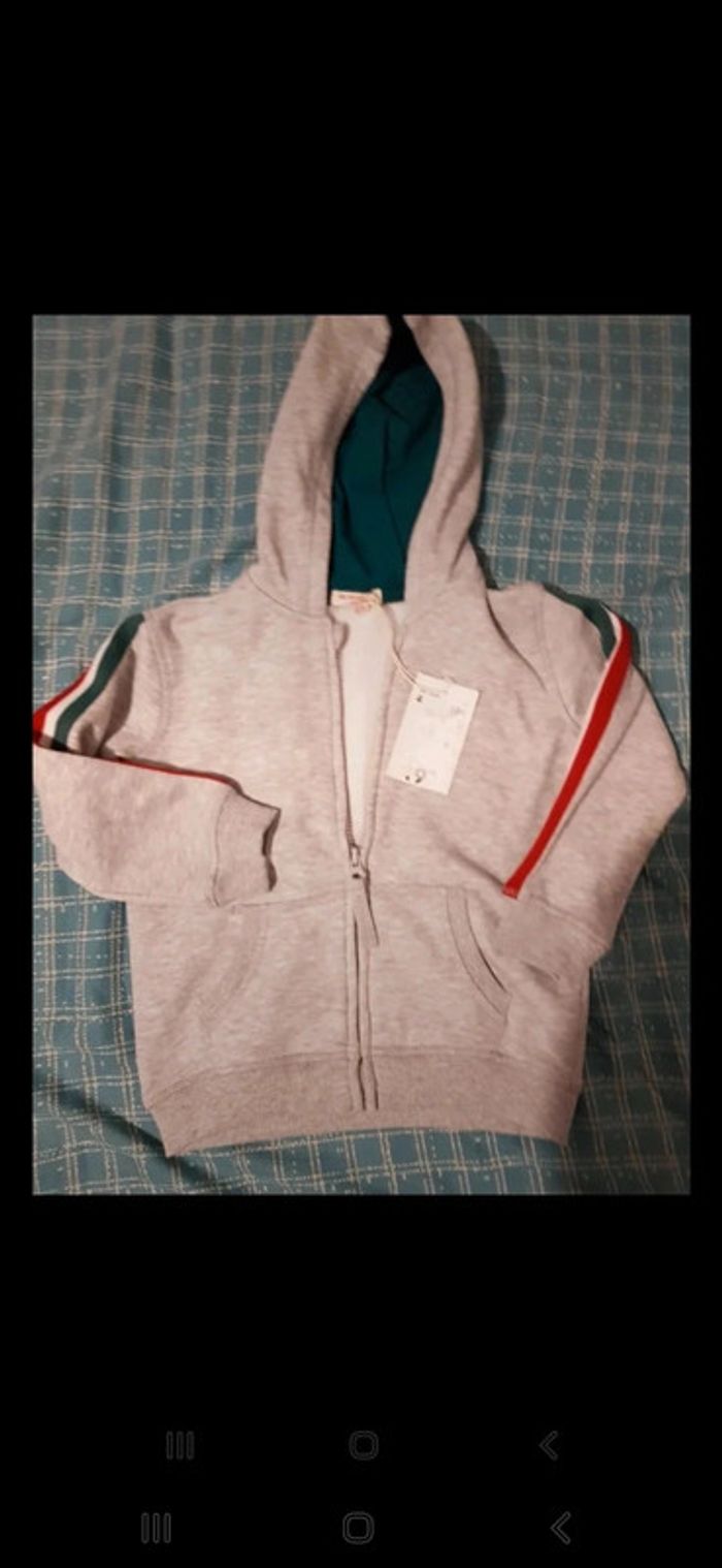 Gilet neuf DPAM 4 ans