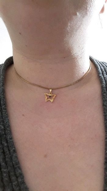 Collier fantaisie pendentif papillon