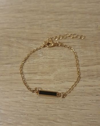 Chaîne dorée pendentif doré et noir neuve