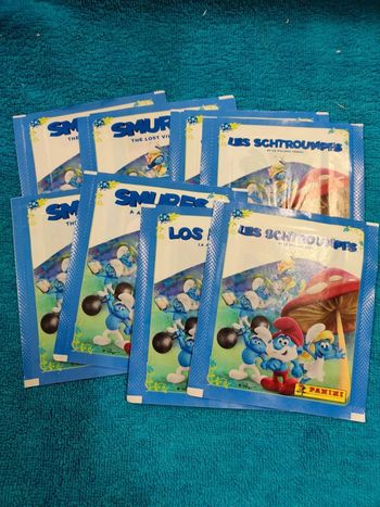 Lot de 8 pochettes Panini Les Schtroumpfs et le village perdu 2019