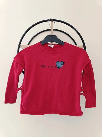 4 ans pull tape a l oeil ( ouverture sur les côtés par des nœuds)