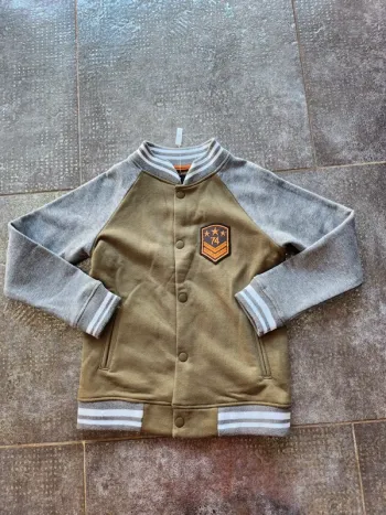 Veste garçon neuve taille 7/8  ans