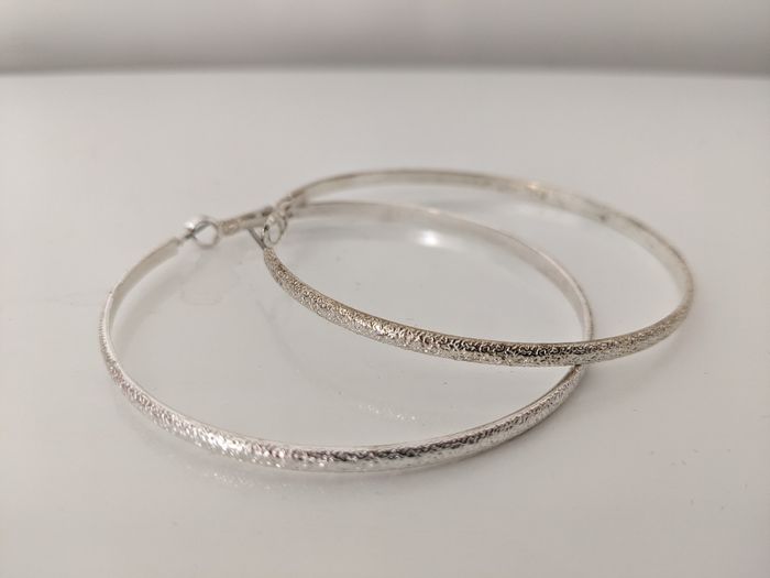 Boucles d'oreilles créoles argentées