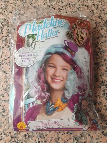 Perruque +serre tete neuf