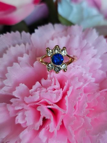 Bague avec zirconium et pierre topaz bleue