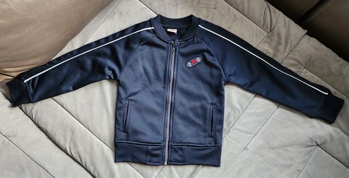 Veste zippée tape à l'oeil