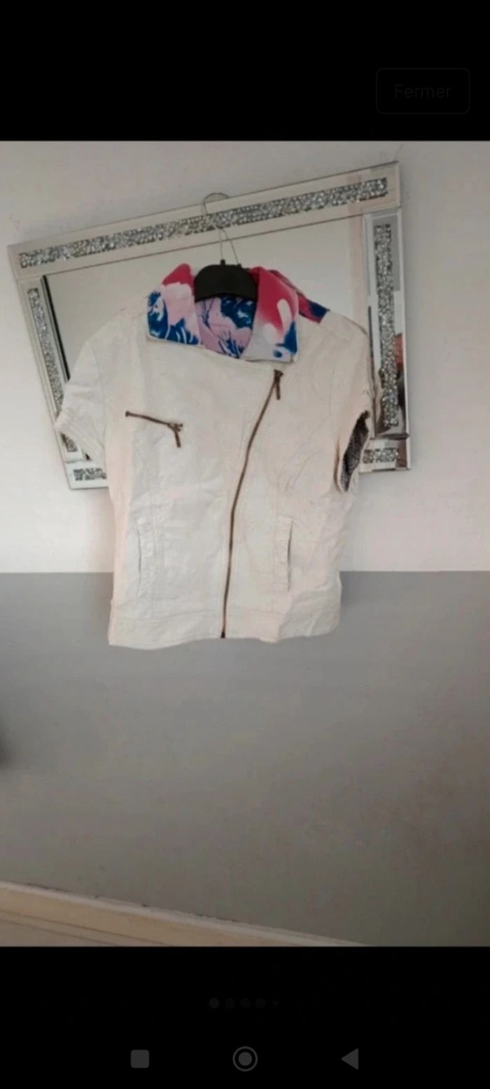 Veste Manche Courte taille S en bon état marque Vivie