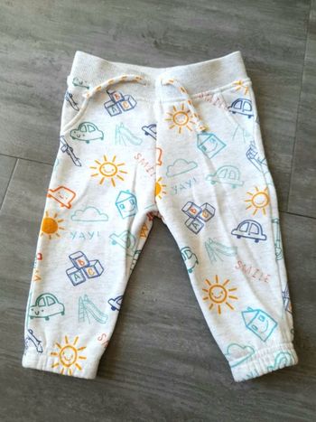 Jogging en molleton crème imprimé