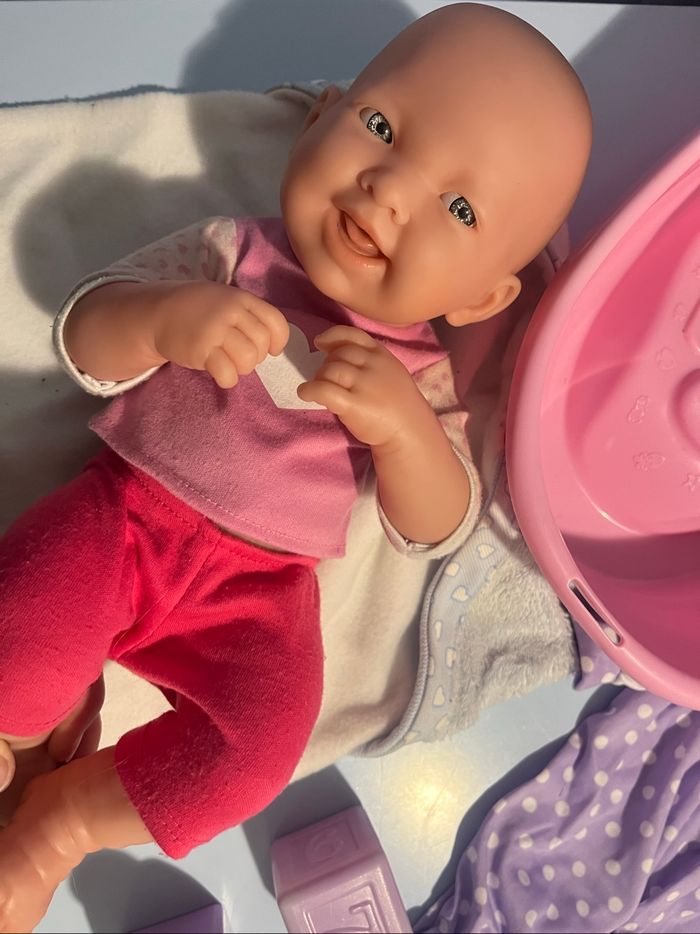 Bébé prend son bain - photo numéro 3