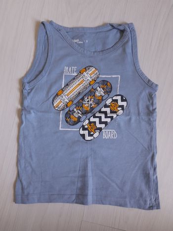 Tee-shirt sans manches T 5 ans