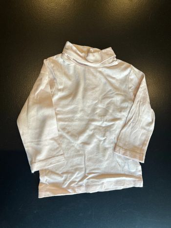 Col roulé rose pale