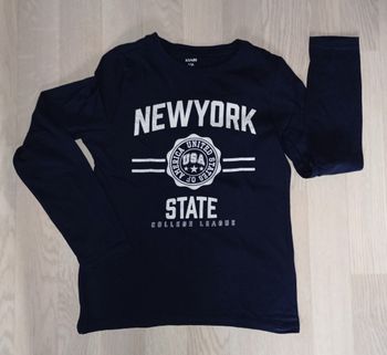 Tee-shirt bleu marine motif New York Kiabi 
T. 10 ans 
NEU