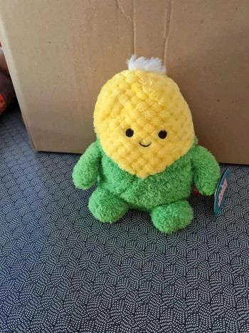 Peluche colby le maïs