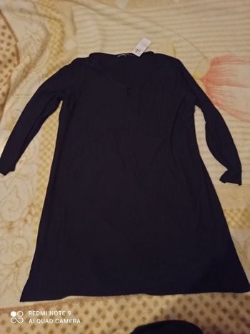 Robe courte ou tunique.