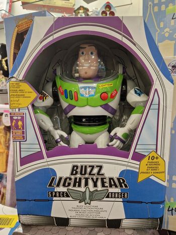 B8-4 Figurine Buzz l'Éclair articulée parlante. English