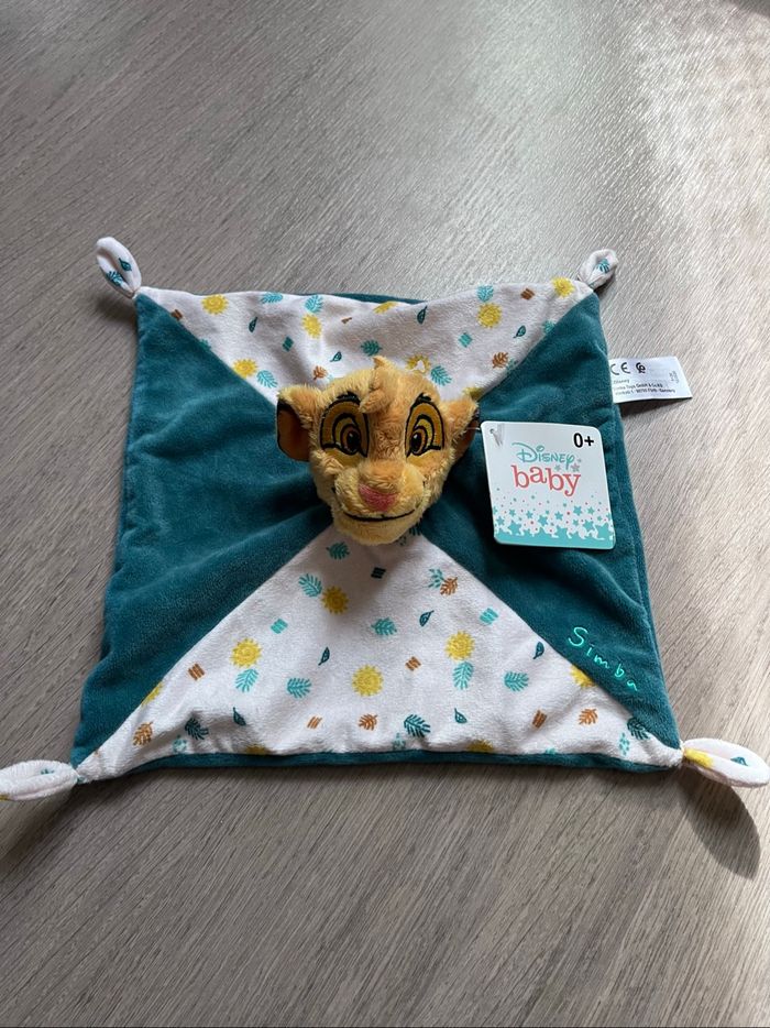 Doudou simba plat bleu et blanc neuf avec étiquette