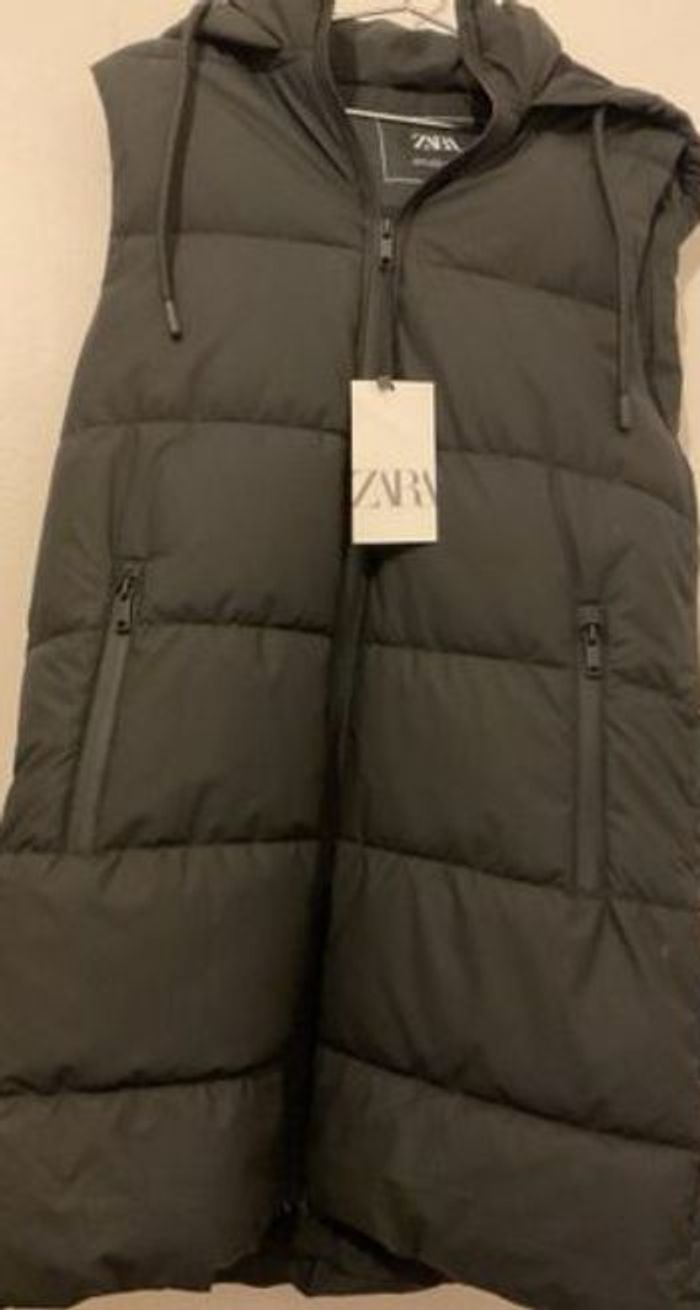 Veste longue sans manches