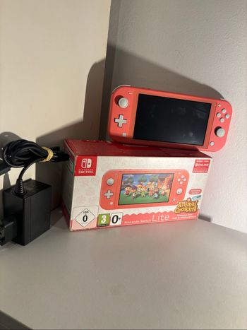 Nintendo switch lite corail animal crossing