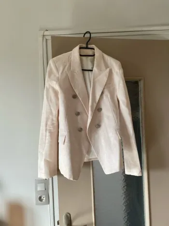 Veste rose pale