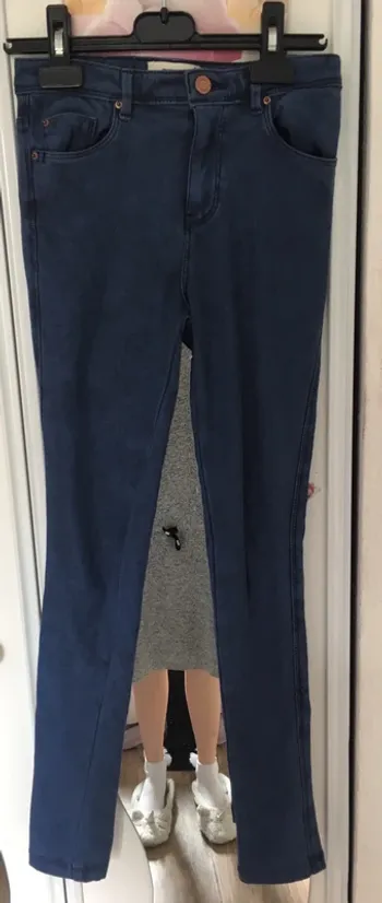 Jean bleu fonce plutôt élastique 32 pimkie