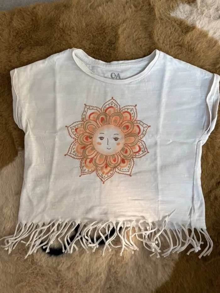 T shirt C&A 4 ans très bon état