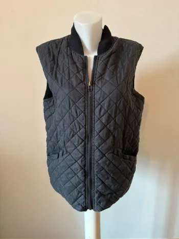 Veste sans manche matelassé en bon état taille S Rusty