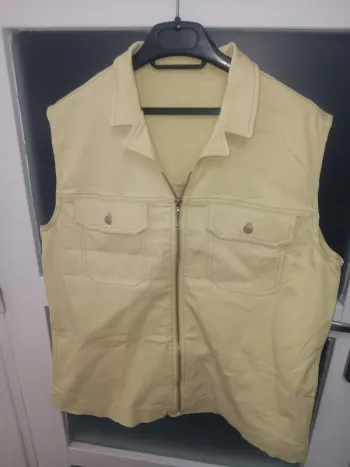 Veste taille 44 sans manches vert à poches zippé vintage
