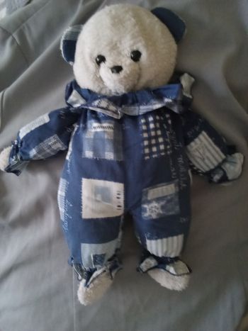 doudou peluche ours ourson de la marque Minouche Thème mer marin marine matelot tête blanche blanc tissu éponge bouclettes yeux noirs durs plastique nez noir dur posture debout ancien 1997