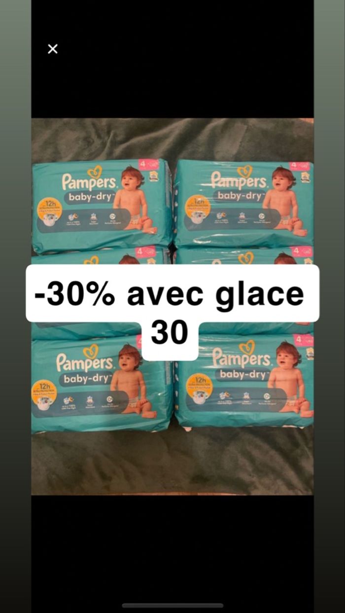 Six paquets de couches Pampers taille 4
