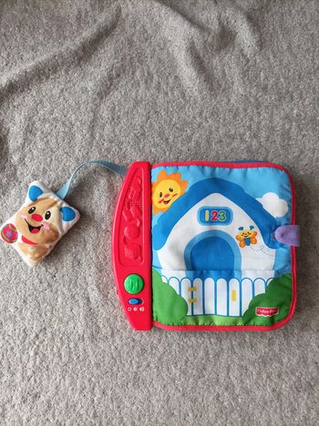 livre en tissu musical fisher price