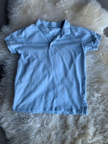 Polo bleu ciel 6/7 ans