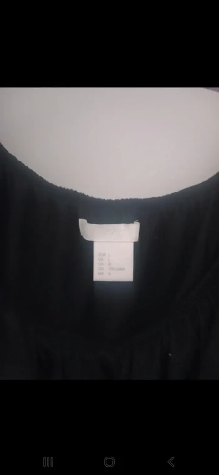 Haut noir volanté H&M – Taille L - photo numéro 2