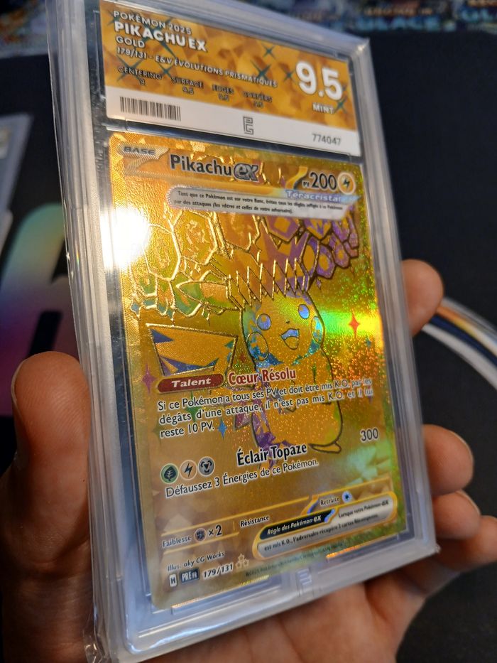 Pikachu EX 🇫🇷 179/131 EV 8.5 – Evolutions Prismatiques • Gold • Pure Grading 9,5 - photo numéro 2