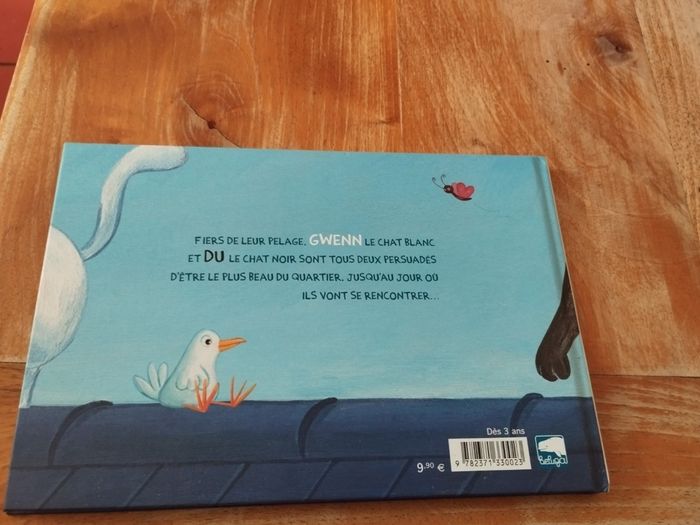 Livre chat noir et chat blanc - photo numéro 2