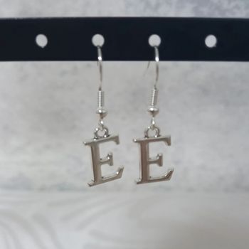 Boucle d'oreille lettre