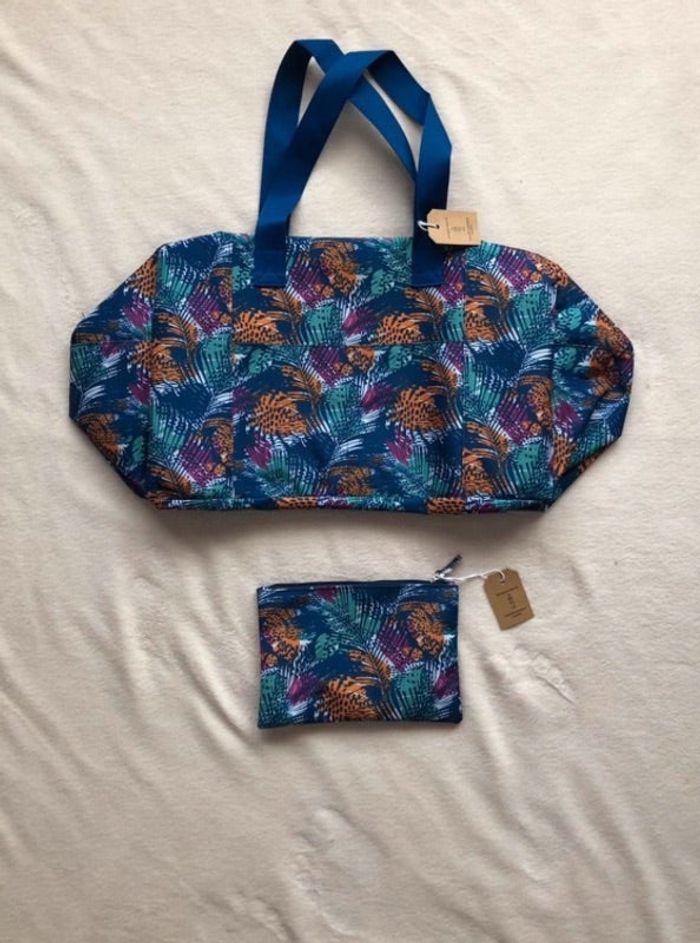 Blanche Porte – Sac de voyage et sa pochette assortie