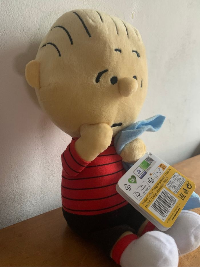 Peluche bébé avec bavoir Peanuts - photo numéro 2